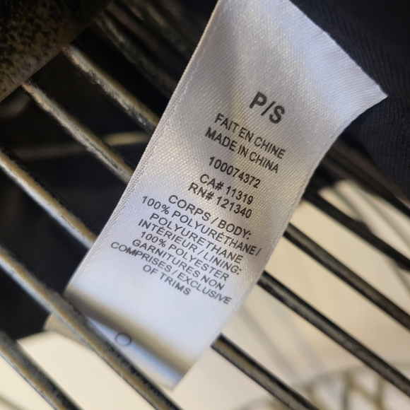 Dynamite, small black faux like leather. - Picture 8 of 8